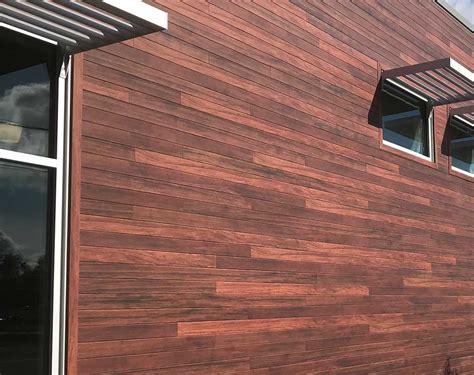 veranda faux wood or metal front of the house|metal panels that look like wood.